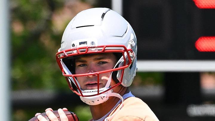 Jun 9, 2026; Foxborough, MA, USA; New England Patriots quarterback Drake Maye (10) targets a member of the coaching staff during minicamp at Gillette Stadium. Mandatory Credit: Eric Canha-Imagn Images