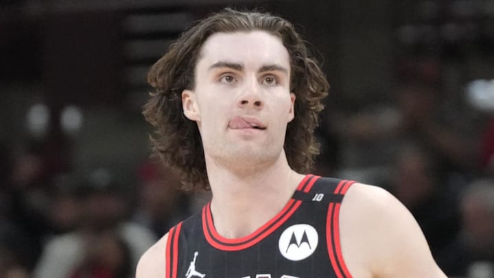 Apr 9, 2025; Chicago, Illinois, USA; Chicago Bulls guard Josh Giddey (3) gestures after making a three point basket against the Miami Heat during the second half at United Center. Mandatory Credit: David Banks-Imagn Images