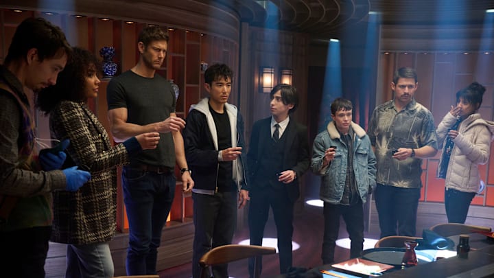 The Umbrella Academy. (L to R) Robert Sheehan as Klaus Hargreeves, Emmy Raver-Lampman as Allison Hargreeves, Tom Hopper as Luther Hargreeves, Justin H. Min as Ben Hargreeves, Aidan Gallagher as Number Five, Elliot Page as Viktor Hargreeves, David Castañeda as Diego Hargreeves, Ritu Arya as Lila Pitts in episode 401 of The Umbrella Academy. Cr. Christos Kalohoridis/Netflix © 2024
