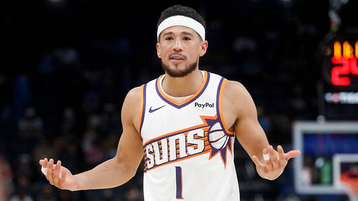 Memphis, Tennessee, USA; Phoenix Suns guard Devin Booker (1) reacts during the third quarter against the Memphis Grizzlies at FedExForum on Mar 30, 2026.