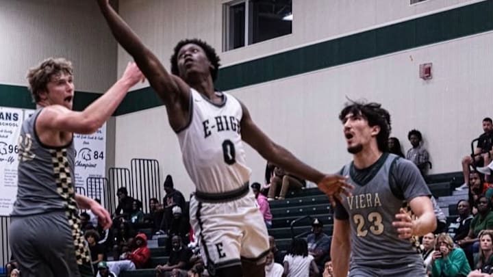 Evans point guard Kadir Rackley (0) drives to the hoop in a Class 6A regional semifinal game against Viera earlier this season. He had 17 points, three assists and two steals to march the Trojans past Lake Howell, 63-51, in the Class 6A state semifinals. Evans point guard Kadir Rackley (0) drives to the hoop in a Class 6A regional semifinal game against Viera earlier this season. He had 17 points, three assists and two steals to march the Trojans past Lake Howell, 63-51, in the Class 6A state semifinals.