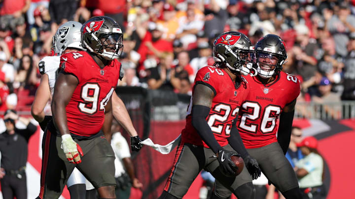Dec 8, 2024; Tampa, Florida, USA; Tampa Bay Buccaneers safety Tykee Smith (23) celebrates after intercepting the ball against the Las Vegas Raiders in the third quarter at Raymond James Stadium. Mandatory Credit: Nathan Ray Seebeck-Imagn Images Dec 8, 2024; Tampa, Florida, USA; Tampa Bay Buccaneers safety Tykee Smith (23) celebrates after intercepting the ball against the Las Vegas Raiders in the third quarter at Raymond James Stadium. Mandatory Credit: Nathan Ray Seebeck-Imagn Images