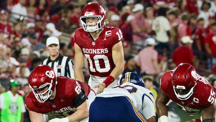 Oklahoma quarterback John Mateer scans the defense before a snap against UTEP. Oklahoma quarterback John Mateer scans the defense before a snap against UTEP.
