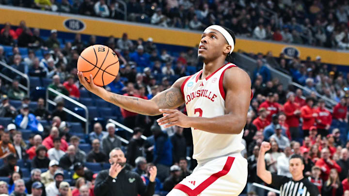 Mar 19, 2026; Buffalo, NY, USA; Louisville Cardinals guard Ryan Conwell (3) drives to the basket for a lay up during the first half against the South Florida Bulls during a first round game of the men's 2026 NCAA Tournament at Keybank Center. Mandatory Credit: Mark Konezny-Imagn Images Mar 19, 2026; Buffalo, NY, USA; Louisville Cardinals guard Ryan Conwell (3) drives to the basket for a lay up during the first half against the South Florida Bulls during a first round game of the men's 2026 NCAA Tournament at Keybank Center. Mandatory Credit: Mark Konezny-Imagn Images