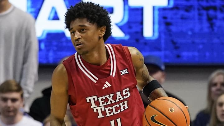 Texas Tech Red Raiders guard Jaylen Petty (11) dribbles the ball during the second half against the BYU Cougars at Marriott Center. 