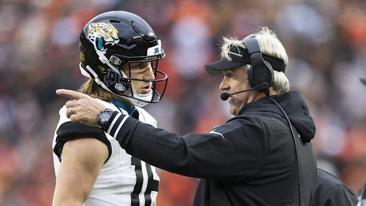 Dec 10, 2023; Cleveland, Ohio, USA; Jacksonville Jaguars head coach Doug Pederson talks with quarterback Trevor Lawrence (16) during the third quarter against the Cleveland Browns at Cleveland Browns Stadium. Mandatory Credit: Scott Galvin-Imagn Images Dec 10, 2023; Cleveland, Ohio, USA; Jacksonville Jaguars head coach Doug Pederson talks with quarterback Trevor Lawrence (16) during the third quarter against the Cleveland Browns at Cleveland Browns Stadium. Mandatory Credit: Scott Galvin-Imagn Images