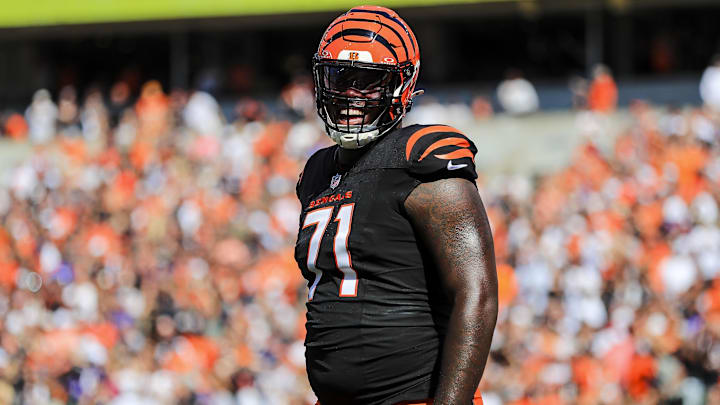Oct 6, 2024; Cincinnati, Ohio, USA; Cincinnati Bengals offensive tackle Amarius Mims (71) reacts after a play in the first half against the Baltimore Ravens at Paycor Stadium. Mandatory Credit: Katie Stratman-Imagn Images