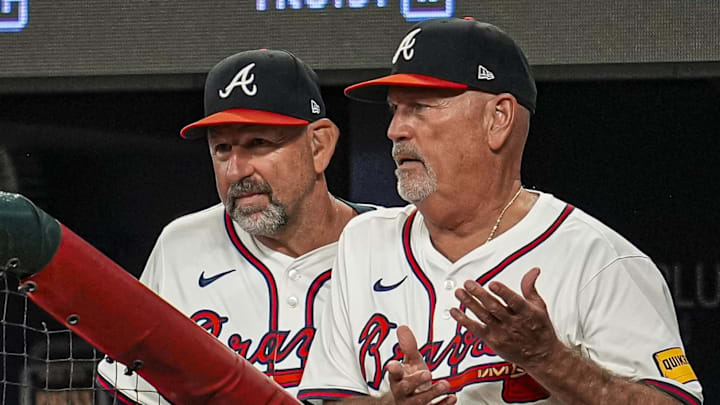 Jul 1, 2025; Cumberland, Georgia, USA; Atlanta Braves manager Brian Snitker (43) shown reacting in the dugout during the game against the Los Angeles Angels during the seventh inning at Truist Park. Mandatory Credit: Dale Zanine-Imagn Images