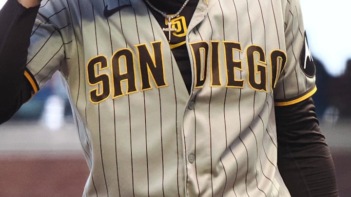 Jun 21, 2023; San Francisco, California, USA; San Diego Padres right fielder Fernando Tatis Jr. (23) holds his helmet after a strike against the San Francisco Giants during the fifth inning at Oracle Park. Mandatory Credit: Kelley L Cox-Imagn Images Jun 21, 2023; San Francisco, California, USA; San Diego Padres right fielder Fernando Tatis Jr. (23) holds his helmet after a strike against the San Francisco Giants during the fifth inning at Oracle Park. Mandatory Credit: Kelley L Cox-Imagn Images