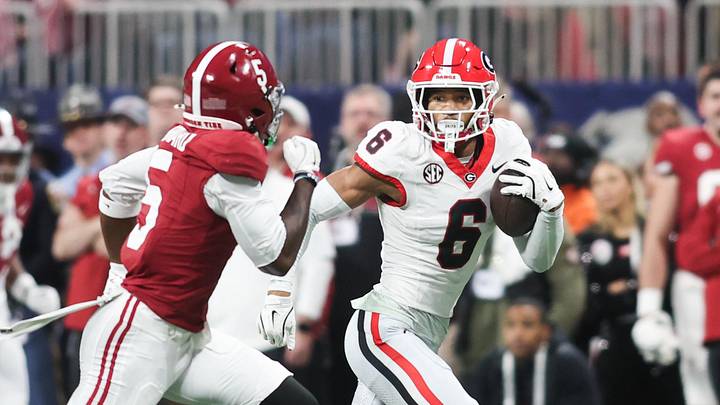 Dec 6, 2025; Atlanta, GA, USA; Georgia Bulldogs defensive back Daylen Everette (6) returns an interception as Alabama Crimson Tide wide receiver Germie Bernard (5) defends during the second quarter during the 2025 SEC Championship game at Mercedes-Benz Stadium. Mandatory Credit: Brett Davis-Imagn Images Dec 6, 2025; Atlanta, GA, USA; Georgia Bulldogs defensive back Daylen Everette (6) returns an interception as Alabama Crimson Tide wide receiver Germie Bernard (5) defends during the second quarter during the 2025 SEC Championship game at Mercedes-Benz Stadium. Mandatory Credit: Brett Davis-Imagn Images