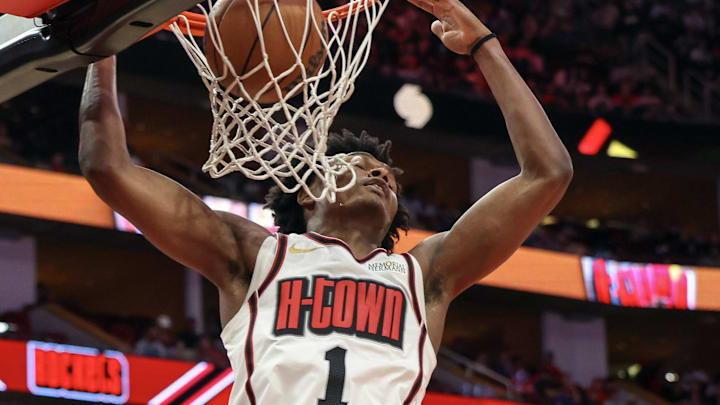Jan 5, 2025; Houston, Texas, USA;  Houston Rockets forward Amen Thompson (1) dunks against the Los Angeles Lakers in the first quarter at Toyota Center. Mandatory Credit: Thomas Shea-Imagn Images