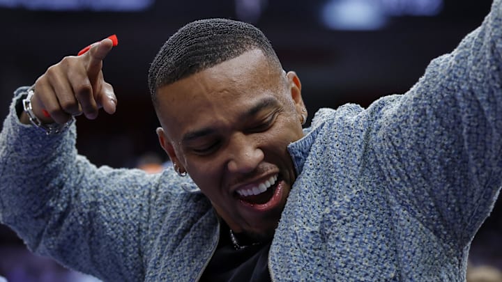 Detroit Lions Amon-Ra St. Brown cheers during the second half of the game between the Detroit Pistons and the Knicks