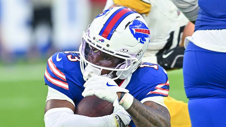 Aug 27, 2026; Orchard Park, New York, USA; Buffalo Bills wide receiver Skyler Bell (13) is tackled by Pittsburgh Steelers defensive back Devan Boykin (40) after making a catch in the second quarter preseason game at New Highmark Stadium. Mandatory Credit: Mark Konezny-Imagn Images