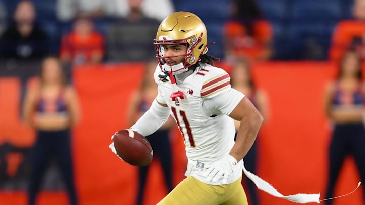 Nov 29, 2025; Syracuse, New York, USA; Boston College Eagles wide receiver Lewis Bond (11) runs against the Syracuse Orange during the second half at the JMA Wireless Dome. Mandatory Credit: Rich Barnes-Imagn Images
