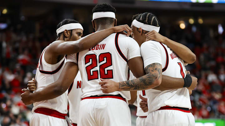 Jan 27, 2026; Raleigh, North Carolina, USA; NC State Wolfpack huddles during the first half of the game against the Syracuse Orange at Lenovo Center. Mandatory Credit: Jaylynn Nash-Imagn Images Jan 27, 2026; Raleigh, North Carolina, USA; NC State Wolfpack huddles during the first half of the game against the Syracuse Orange at Lenovo Center. Mandatory Credit: Jaylynn Nash-Imagn Images