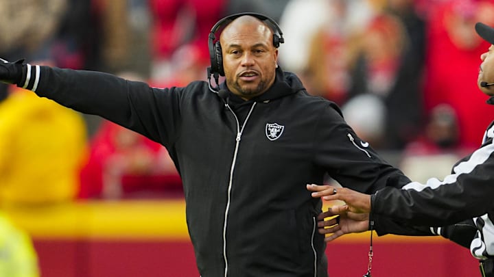 Nov 29, 2024; Kansas City, Missouri, USA; Las Vegas Raiders head coach Antonio Pierce reacts during the first half against the Kansas City Chiefs at GEHA Field at Arrowhead Stadium. Mandatory Credit: Jay Biggerstaff-Imagn Images