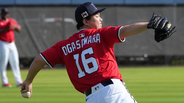 Feb 15, 2025; West Palm Beach, FL, USA; Washington Nationals pitcher Shinnosuke Ogasawara (16) warms up before Spring Training activities