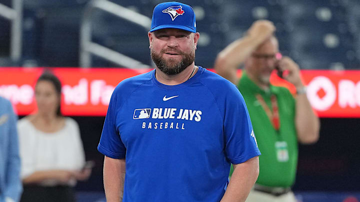 Aug 12, 2025; Toronto, Ontario, CAN; Toronto Blue Jays manager John Schneider (14) watches batting practice before a game against the Chicago Cubs at Rogers Centre. Mandatory Credit: Nick Turchiaro-Imagn Images Aug 12, 2025; Toronto, Ontario, CAN; Toronto Blue Jays manager John Schneider (14) watches batting practice before a game against the Chicago Cubs at Rogers Centre. Mandatory Credit: Nick Turchiaro-Imagn Images
