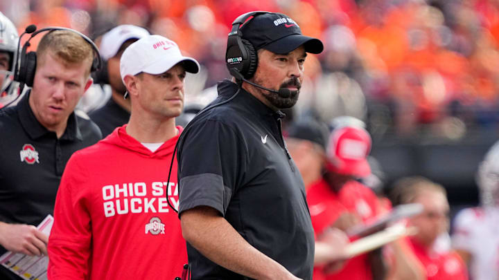 Ohio State Buckeyes head coach Ryan Day watches during the second half of the NCAA football game against the Illinois Fighting Illini at Gies Memorial Stadium in Champaign on Oct. 11, 2025. Ohio State won 34-16. Ohio State Buckeyes head coach Ryan Day watches during the second half of the NCAA football game against the Illinois Fighting Illini at Gies Memorial Stadium in Champaign on Oct. 11, 2025. Ohio State won 34-16.
