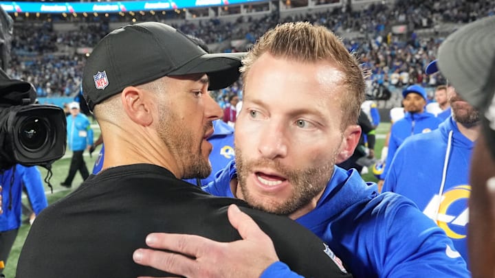 Jan 10, 2026; Charlotte, NC, USA; Los Angeles Rams head coach Sean McVay and Carolina Panthers head coach Dave Canales meet after the game in the NFC Wild Card Round game at Bank of America Stadium. Mandatory Credit: Bob Donnan-Imagn Images Jan 10, 2026; Charlotte, NC, USA; Los Angeles Rams head coach Sean McVay and Carolina Panthers head coach Dave Canales meet after the game in the NFC Wild Card Round game at Bank of America Stadium. Mandatory Credit: Bob Donnan-Imagn Images