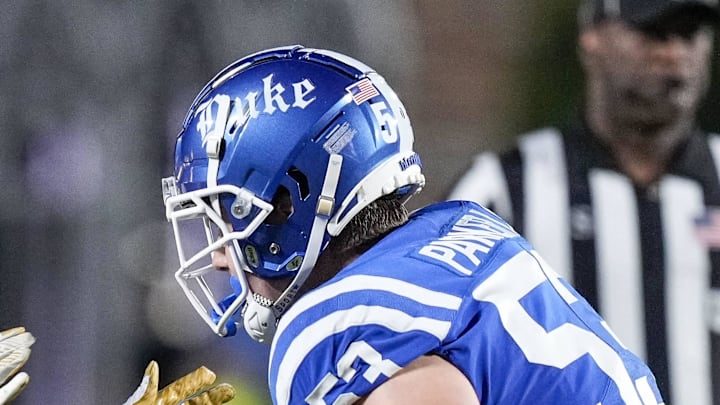 Sep 30, 2023; Durham, North Carolina, USA; Notre Dame Fighting Irish defensive lineman Nana Osafo-Mensah (31) against Duke Blue Devils offensive lineman Brian Parker II (53) during the second half at Wallace Wade Stadium. Mandatory Credit: Jim Dedmon-Imagn Images