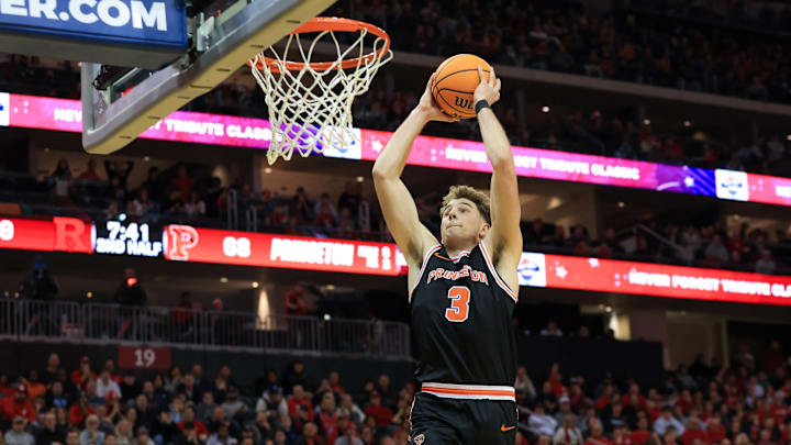 Dec 21, 2024; Newark, New Jersey, USA; Princeton Tigers forward Caden Pierce (3) dunks the ball against the Rutgers Scarlet Knights during the second half at Prudential Center. Mandatory Credit: Tom Horak-Imagn Images