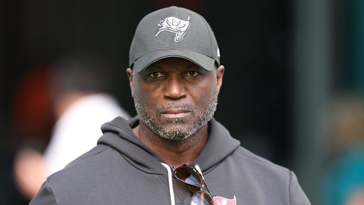 Tampa Bay Buccaneers head coach Todd Bowles walks around the field during warmups prior to a game against the Miami Dolphins
