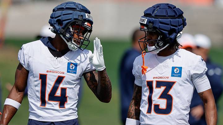 Jul 24, 2025; Englewood, CO, USA; Denver Broncos wide receiver Courtland Sutton (14) and wide receiver Pat Bryant (13) during Denver Broncos Training Camp. Jul 24, 2025; Englewood, CO, USA; Denver Broncos wide receiver Courtland Sutton (14) and wide receiver Pat Bryant (13) during Denver Broncos Training Camp.