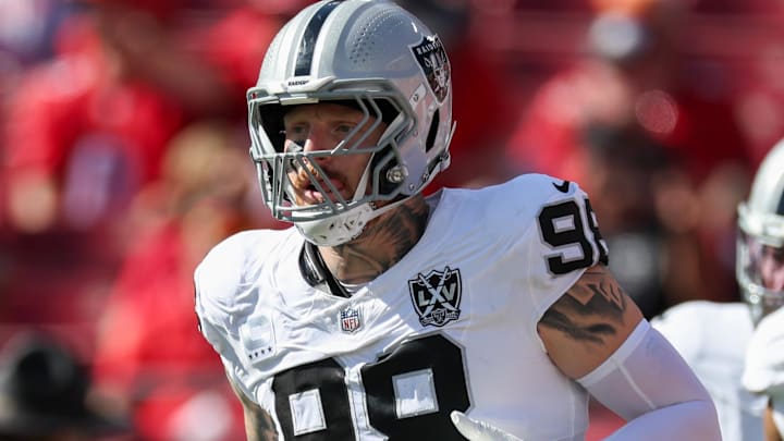 Dec 8, 2024; Tampa, Florida, USA; Las Vegas Raiders defensive end Maxx Crosby (98) takes the field for a game against the Tampa Bay Buccaneers at Raymond James Stadium. Mandatory Credit: Nathan Ray Seebeck-Imagn Images