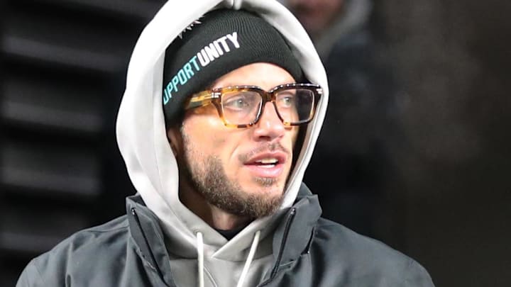 Dec 15, 2025; Pittsburgh, Pennsylvania, USA;  Miami Dolphins head coach Mike McDaniel walks onto the field against the Pittsburgh Steelers at Acrisure Stadium. Mandatory Credit: Charles LeClaire-Imagn Images