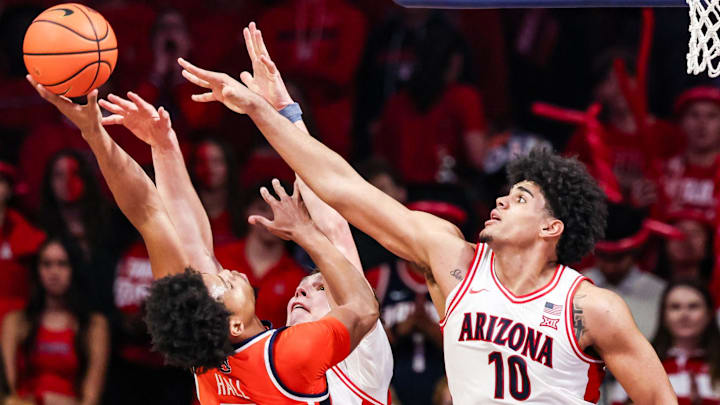 Dec 6, 2025; Tucson, Arizona, USA; Auburn Tigers forward Keyshawn Hall (7) makes a lay up over Arizona Wildcats forward Koa Peat (10) during the second half of the game at McKale Memorial Center. Mandatory Credit: Aryanna Frank-Imagn Images Dec 6, 2025; Tucson, Arizona, USA; Auburn Tigers forward Keyshawn Hall (7) makes a lay up over Arizona Wildcats forward Koa Peat (10) during the second half of the game at McKale Memorial Center. Mandatory Credit: Aryanna Frank-Imagn Images