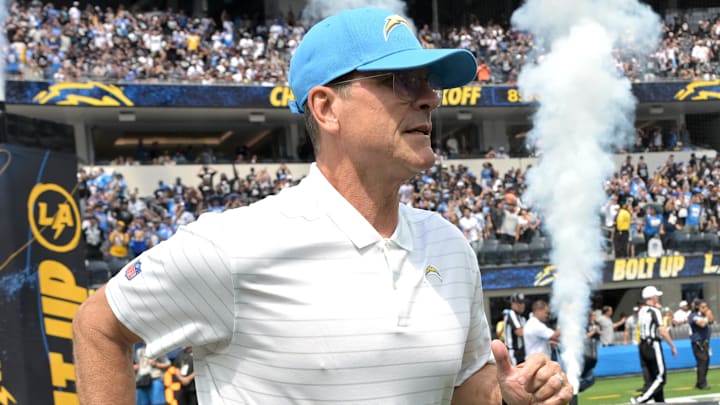 Sep 8, 2024; Inglewood, California, USA; Los Angeles Chargers head coach Jim Harbaugh runs on to the field for the game against the Las Vegas Raiders at SoFi Stadium. Mandatory Credit: Jayne Kamin-Oncea-Imagn Images