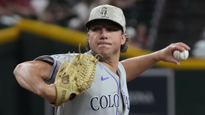 Colorado Rockies pitcher Ryan Rolison (50) throws against the Arizona Diamondbacks at Chase Field. Colorado Rockies pitcher Ryan Rolison (50) throws against the Arizona Diamondbacks at Chase Field.