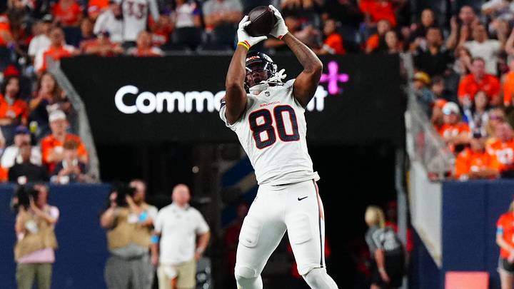 Denver Broncos tight end Justin Joly (80) pulls in a reception for a touchdown in the second half during a preseason game against the Minnesota Vikings. Denver Broncos tight end Justin Joly (80) pulls in a reception for a touchdown in the second half during a preseason game against the Minnesota Vikings.