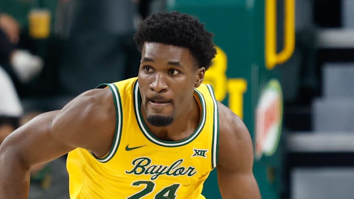 Mar 7, 2026; Waco, Texas, USA;  Baylor Bears guard Tounde Yessoufou (24) dribbles the ball up court against the Utah Utes during the first half at Paul and Alejandra Foster Pavilion. Mandatory Credit: Chris Jones-Imagn Images