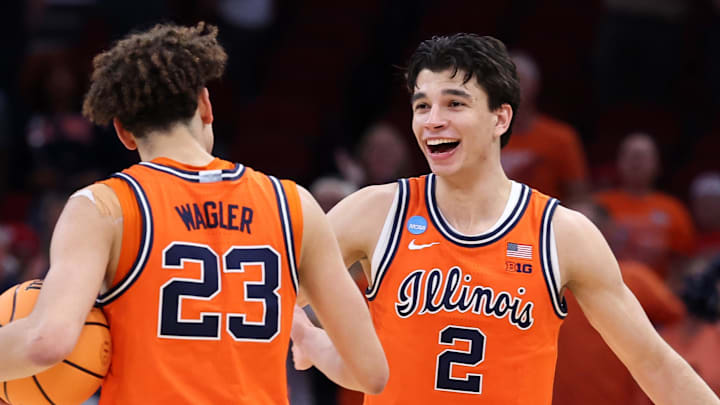 Mar 26, 2026; Houston, TX, USA; Illinois Fighting Illini guard Keaton Wagler (23) and guard Andrej Stojakovic (2) reacts after the game in a Sweet Sixteen game of the South Regional of the men's 2026 NCAA Tournament at Toyota Center. Mandatory Credit: Troy Taormina-Imagn Images