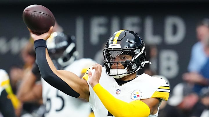 Pittsburgh Steelers quarterback Justin Fields throws a pass.