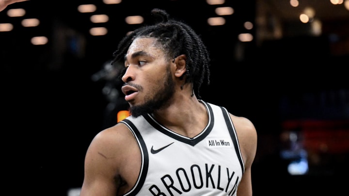 Nov 3, 2025; Brooklyn, New York, USA; Brooklyn Nets guard Cam Thomas (24) tries to drive past Minnesota Timberwolves center Rudy Gobert (27) and guard Jaylen Clark (22) during the second half at Barclays Center. Mandatory Credit: John Jones-Imagn Images