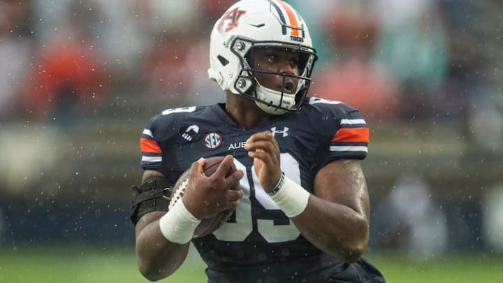 Auburn DT J.J. Pegues (89) does a spin move as he runs the ball at Jordan Hare Stadium in Auburn, Alabama