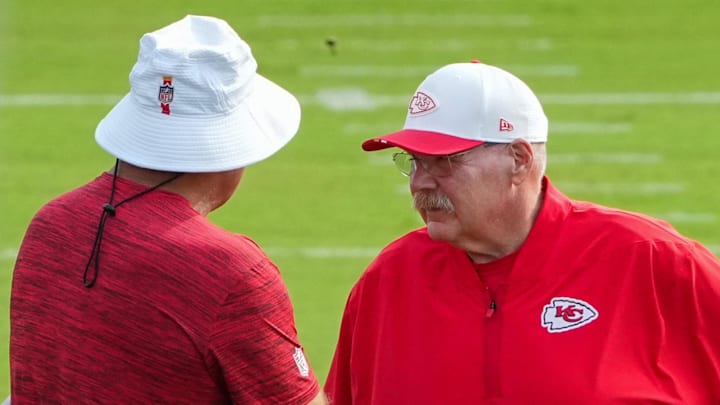 Jul 22, 2025; St. Joseph, MO, USA; Kansas City Chiefs head coach Andy Reid speaks with a staff member on field during training camp at Missouri Western State University. Mandatory Credit: Denny Medley-Imagn Images Jul 22, 2025; St. Joseph, MO, USA; Kansas City Chiefs head coach Andy Reid speaks with a staff member on field during training camp at Missouri Western State University. Mandatory Credit: Denny Medley-Imagn Images