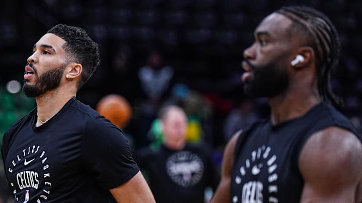 Jan 10, 2025; Boston, Massachusetts, USA; Boston Celtics forward Jayson Tatum (0) and guard Jaylen Brown (7) warm up before the start of the game against the Sacramento Kings at TD Garden. Mandatory Credit: David Butler II-Imagn Images
