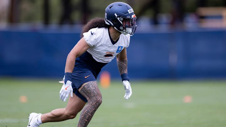 Denver Broncos safety Talanoa Hufanga (9) practices during OTAs at Broncos Park Powered by CommonSpirit. 