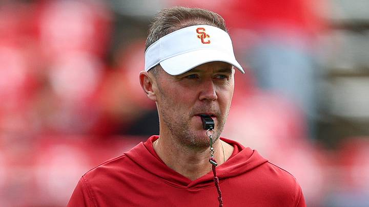 Sep 19, 2026; Piscataway, New Jersey, USA; USC Trojans head coach Lincoln Riley on the field during warm ups before the game against the Rutgers Scarlet Knights at SHI Stadium. Mandatory Credit: Vincent Carchietta-Imagn Images Sep 19, 2026; Piscataway, New Jersey, USA; USC Trojans head coach Lincoln Riley on the field during warm ups before the game against the Rutgers Scarlet Knights at SHI Stadium. Mandatory Credit: Vincent Carchietta-Imagn Images