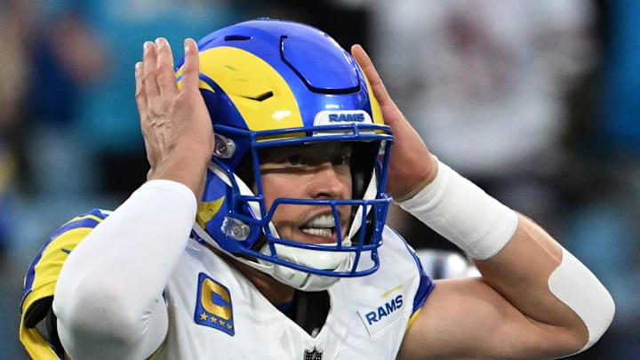 Jan 10, 2026; Charlotte, NC, USA; Los Angeles Rams quarterback Matthew Stafford (9) changes signals at the line in the first quarter in an NFC Wild Card Round game at Bank of America Stadium. Mandatory Credit: Bob Donnan-Imagn Images