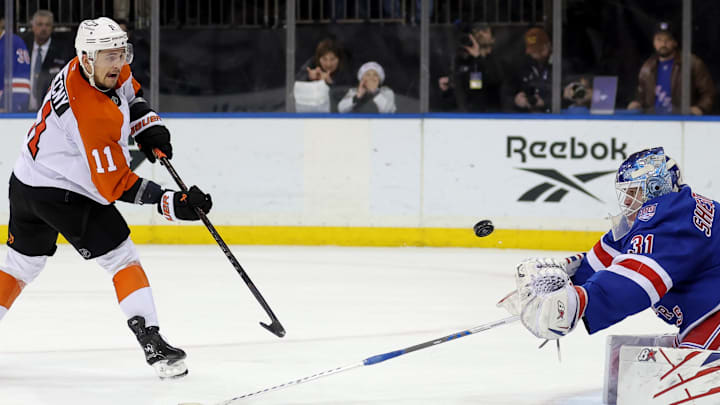Dec 20, 2025; New York, New York, USA; Philadelphia Flyers right wing Travis Konecny (11) misses his shot against New York Rangers goaltender Igor Shesterkin (31) during the shootout at Madison Square Garden. Mandatory Credit: Brad Penner-Imagn Images