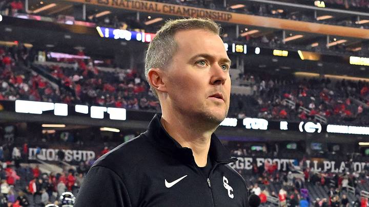 Southern California Trojans head coach Lincoln Riley walks the field before the CFP national championship game between the TCU Horned Frogs and the Georgia Bulldogs at SoFi Stadium. Southern California Trojans head coach Lincoln Riley walks the field before the CFP national championship game between the TCU Horned Frogs and the Georgia Bulldogs at SoFi Stadium.