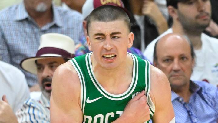 May 13, 2024; Cleveland, Ohio, USA; Boston Celtics guard Payton Pritchard (11) celebrates his three-point basket in the third quarter of game four of the second round for the 2024 NBA playoffs against the Cleveland Cavaliers at Rocket Mortgage FieldHouse. Mandatory Credit: David Richard-USA TODAY Sports