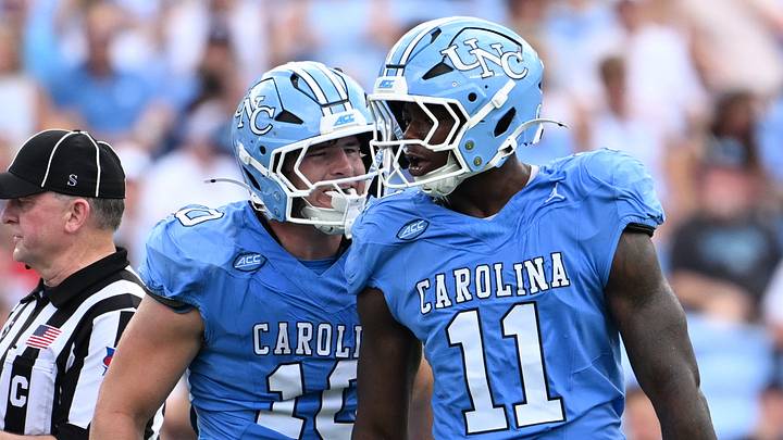 Sep 12, 2026; Chapel Hill, North Carolina, USA; North Carolina Tar Heels defensive end Jaylen Harvey (11) celebrates with linebacker Peyton Seelmann (10) after making a sack in the second quarter at Kenan Stadium. Mandatory Credit: Bob Donnan-Imagn Images Sep 12, 2026; Chapel Hill, North Carolina, USA; North Carolina Tar Heels defensive end Jaylen Harvey (11) celebrates with linebacker Peyton Seelmann (10) after making a sack in the second quarter at Kenan Stadium. Mandatory Credit: Bob Donnan-Imagn Images