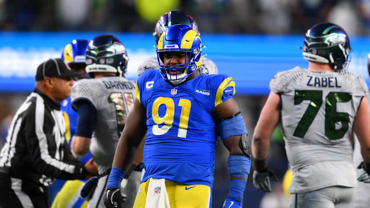 Dec 18, 2025; Seattle, Washington, USA; Los Angeles Rams defensive end Kobie Turner (91) reacts after a sack against the Seattle Seahawks in the second half at Lumen Field. Mandatory Credit: Steven Bisig-Imagn Images Dec 18, 2025; Seattle, Washington, USA; Los Angeles Rams defensive end Kobie Turner (91) reacts after a sack against the Seattle Seahawks in the second half at Lumen Field. Mandatory Credit: Steven Bisig-Imagn Images