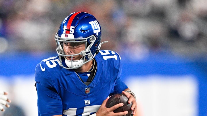 Aug 21, 2025; East Rutherford, New Jersey, USA; New York Giants quarterback Tommy DeVito (15) runs with the ball against the New England Patriots. Aug 21, 2025; East Rutherford, New Jersey, USA; New York Giants quarterback Tommy DeVito (15) runs with the ball against the New England Patriots.